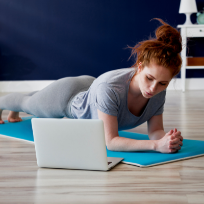 home gym experience, virtual programming showing white women doing yoga