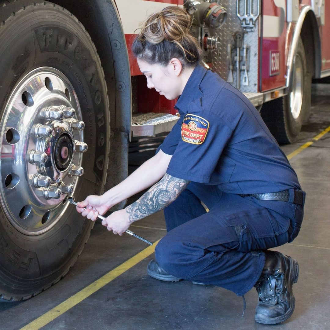 Firefighter Amanda Newhall Truck Tire Squat